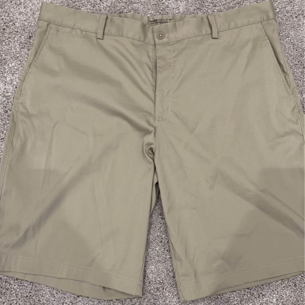 Nike 38, 10in inseam golf shorts.
